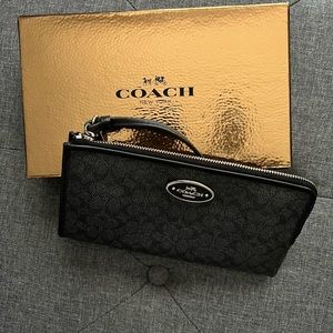 Black Coach wristlet.